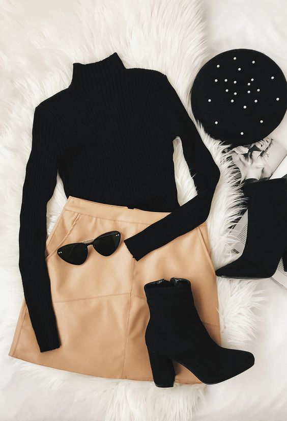 leather skirt and sweater
